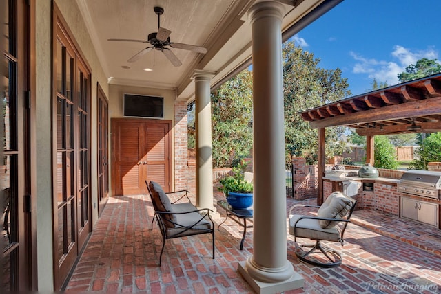 view of patio / terrace with ceiling fan, a grill, a pergola, and exterior kitchen