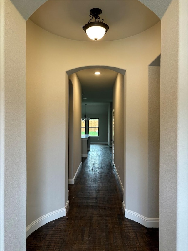 314 Mercer Dr, Josephine, TX 75173 - corridor with arched walkways, wood finished floors, and baseboards