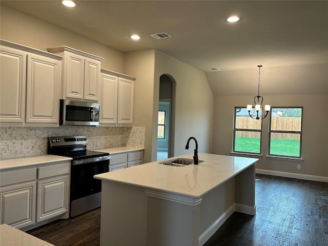 314 Mercer Dr, Josephine, TX 75173 - kitchen featuring appliances with stainless steel finishes, a sink, arched walkways, backsplash, and recessed lighting