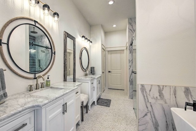 bathroom featuring vanity and separate shower and tub