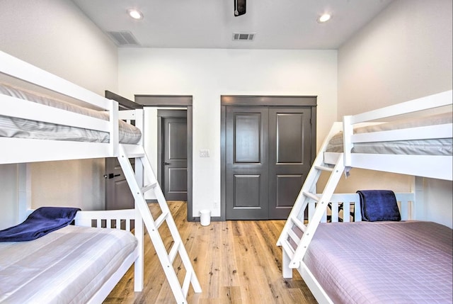 bedroom with light hardwood / wood-style flooring