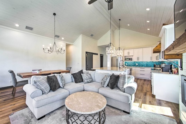 living room featuring high vaulted ceiling, hardwood / wood-style flooring, wooden ceiling, and ceiling fan with notable chandelier