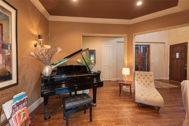 miscellaneous room with wood-type flooring and ornamental molding