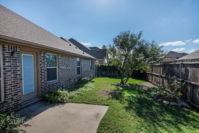 view of yard with a patio area