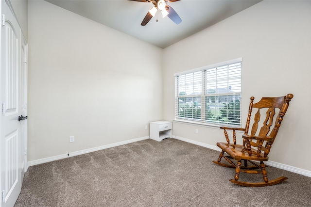 sitting room with carpet floors and ceiling fan