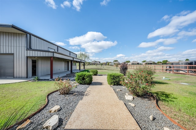 view of yard featuring a garage