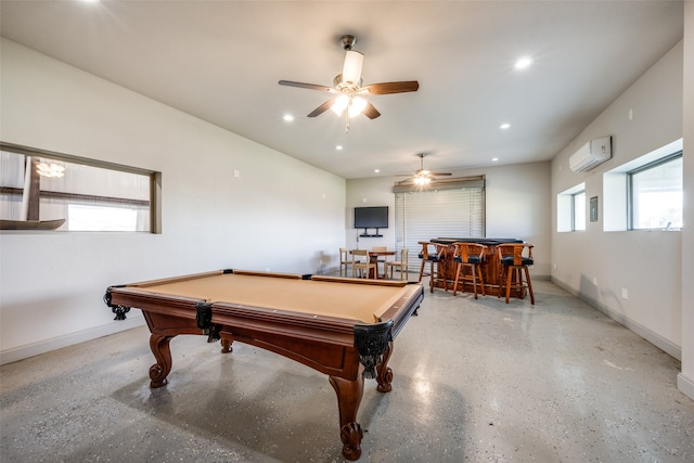 recreation room featuring billiards, bar, an AC wall unit, and ceiling fan