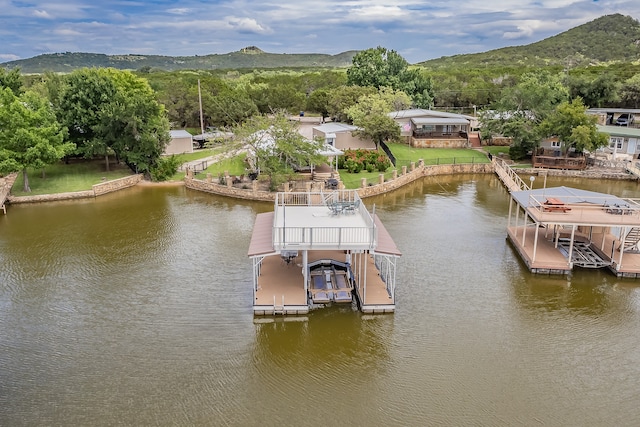 dock area featuring a water and mountain view