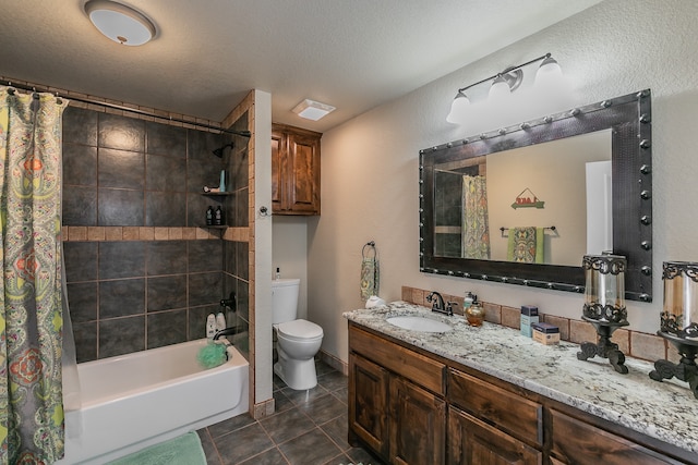 full bathroom featuring vanity, a textured ceiling, tile patterned flooring, toilet, and shower / bath combo with shower curtain