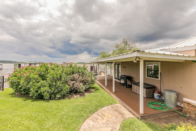 view of yard with a wooden deck