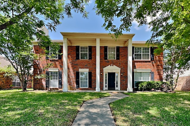 view of front of home with a front yard