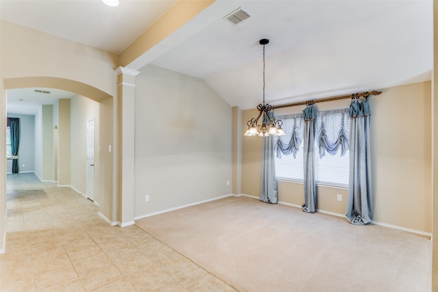 carpeted spare room with ornate columns, lofted ceiling, and a notable chandelier