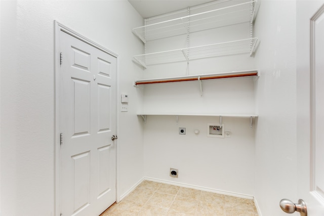 laundry area with electric dryer hookup, gas dryer hookup, and washer hookup