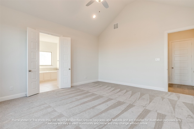 unfurnished bedroom featuring light carpet, baseboards, visible vents, and ensuite bathroom