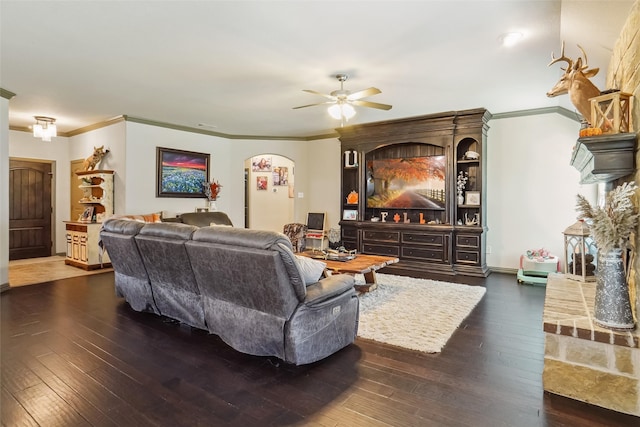 living room with dark hardwood / wood-style floors and ornamental molding