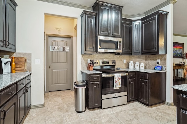 kitchen featuring backsplash, light stone counters, stainless steel appliances, and ornamental molding