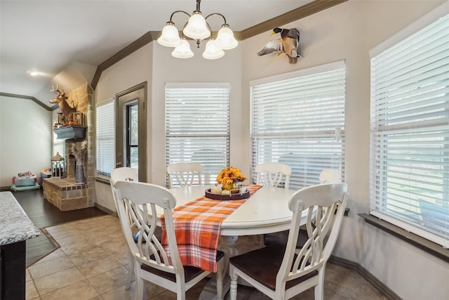 dining room featuring a healthy amount of sunlight and ornamental molding