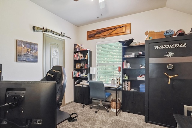 carpeted home office featuring ceiling fan and lofted ceiling