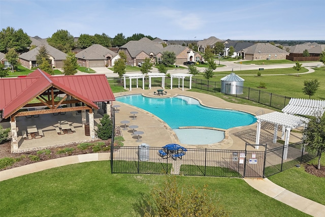 view of pool with a gazebo, a yard, and a patio area