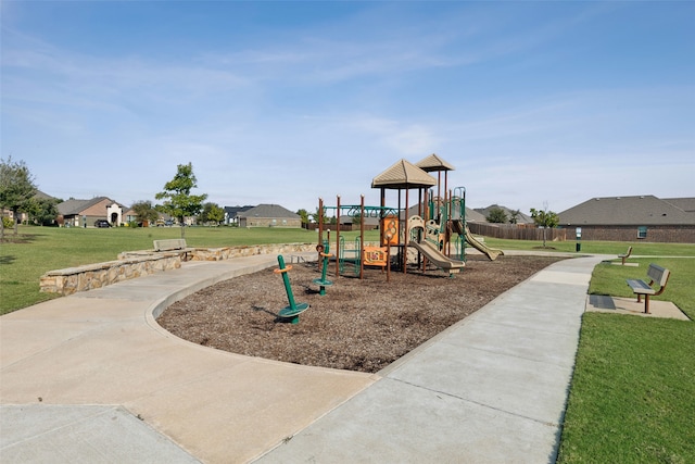 view of jungle gym with a lawn