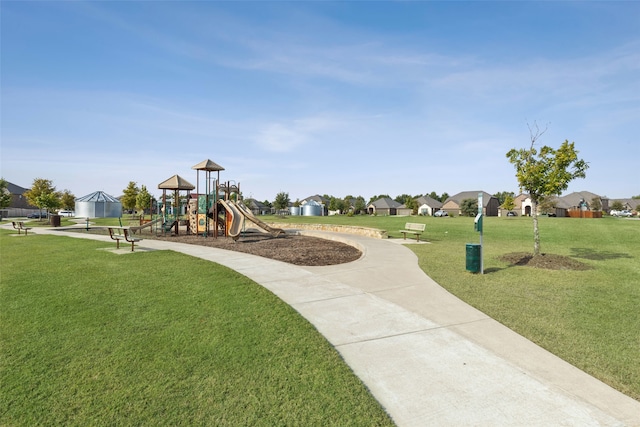 view of jungle gym with a yard