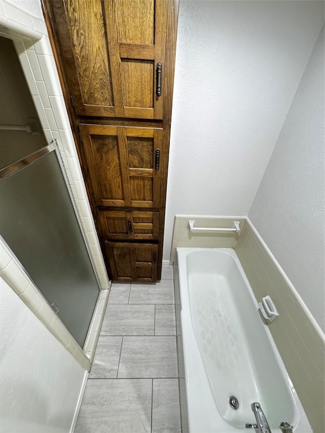 bathroom with independent shower and bath