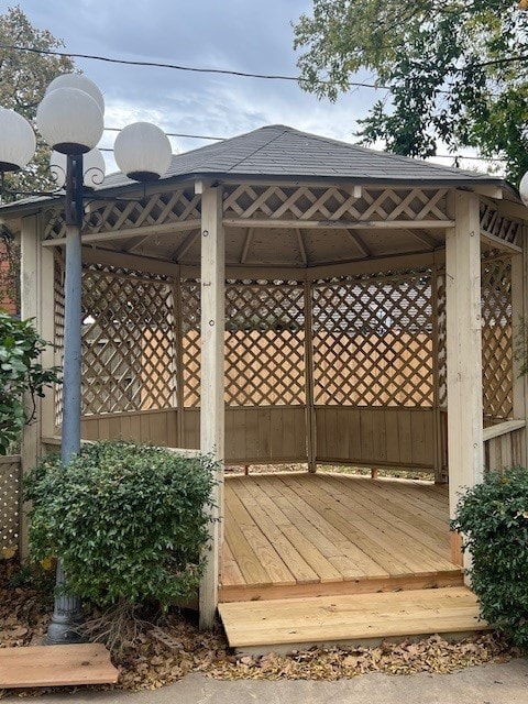 wooden terrace with a gazebo