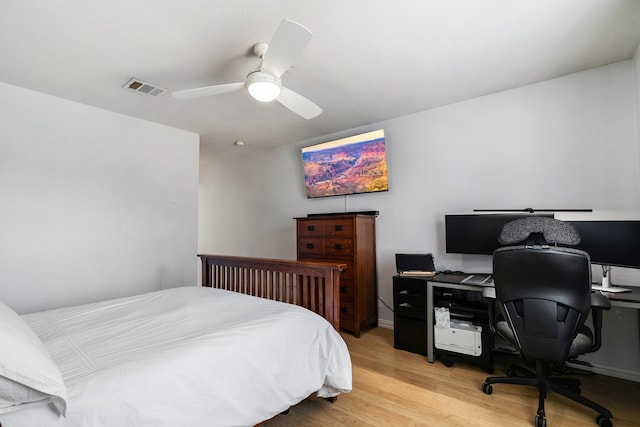 bedroom featuring light hardwood / wood-style flooring and ceiling fan