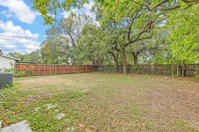 view of yard featuring central AC