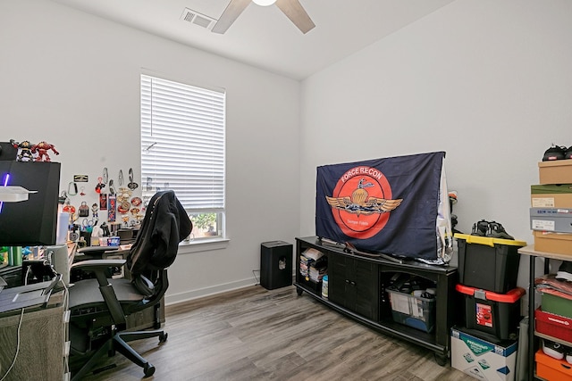 office featuring hardwood / wood-style floors and ceiling fan