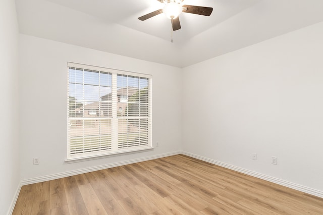 spare room featuring ceiling fan and light hardwood / wood-style flooring