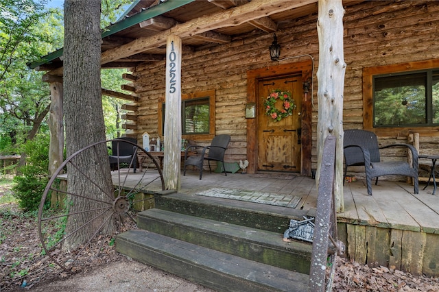 property entrance with a porch