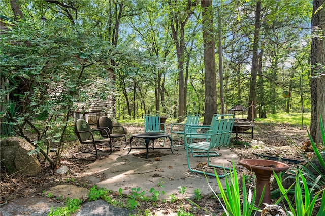 view of patio featuring an outdoor fire pit