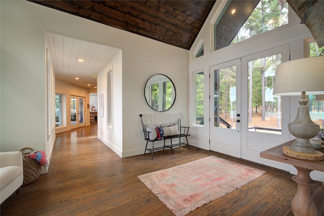 entryway featuring beam ceiling, french doors, dark hardwood / wood-style flooring, high vaulted ceiling, and wood ceiling