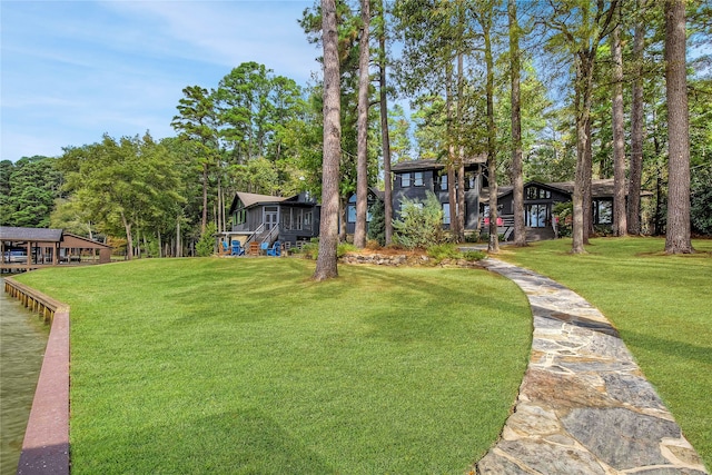 view of yard with a sunroom