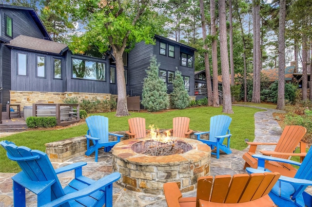 view of patio / terrace featuring a fire pit