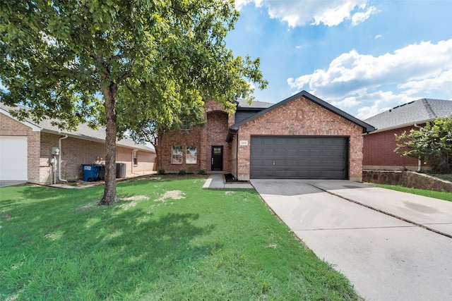 view of front of property featuring central AC unit, a garage, and a front yard