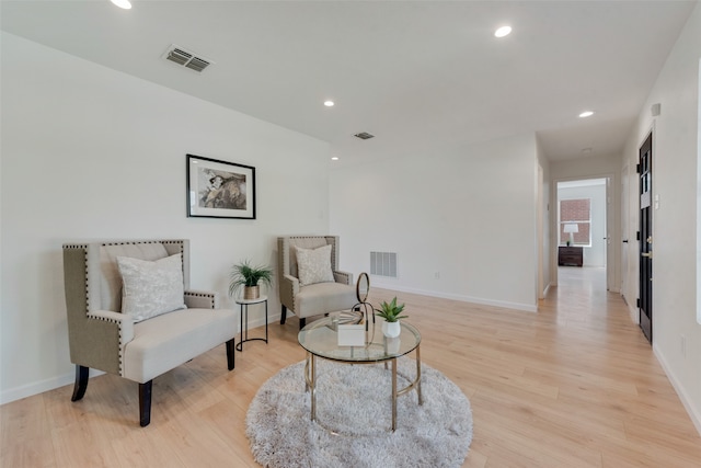 sitting room with light wood-type flooring