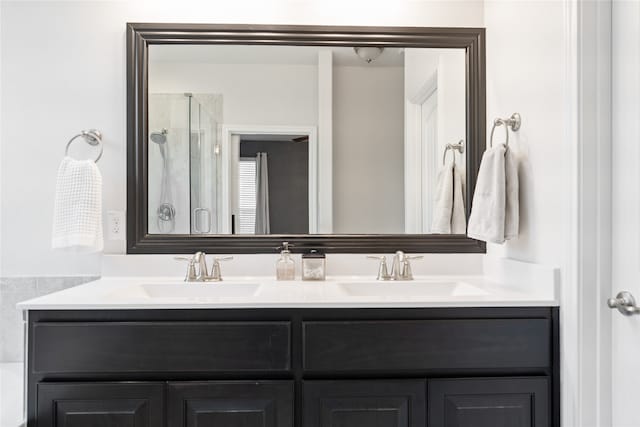 bathroom with vanity and walk in shower