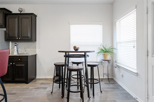 dining space featuring light hardwood / wood-style flooring