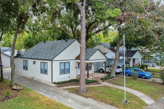 bungalow with a front lawn