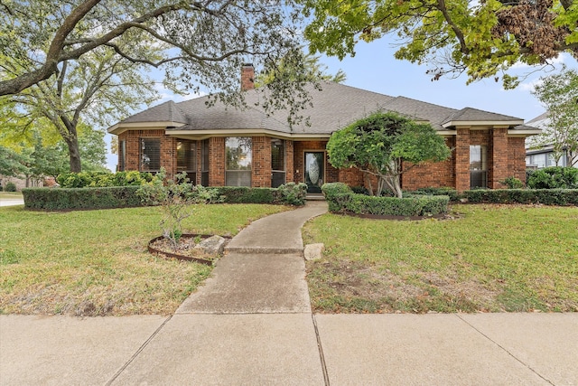 single story home with a front yard