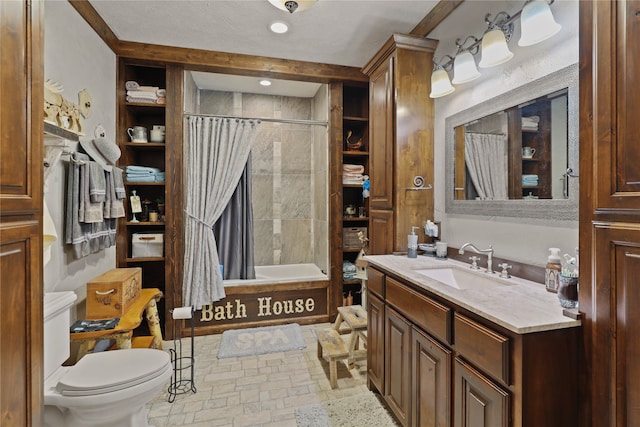 full bathroom featuring vanity, toilet, and shower / bath combination with curtain