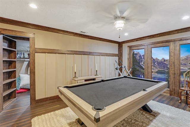 game room with billiards, dark hardwood / wood-style flooring, a textured ceiling, and ceiling fan