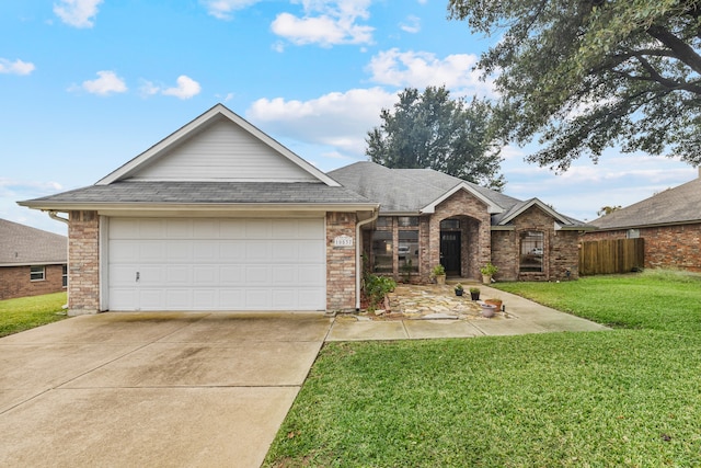 ranch-style house with a front lawn and a garage