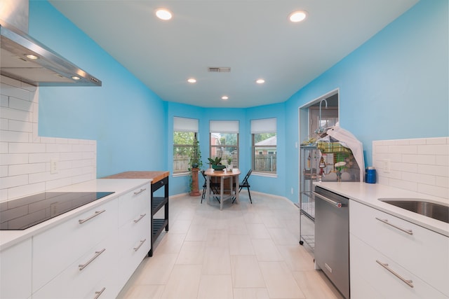 kitchen featuring tasteful backsplash, black electric stovetop, white cabinets, dishwasher, and wall chimney exhaust hood