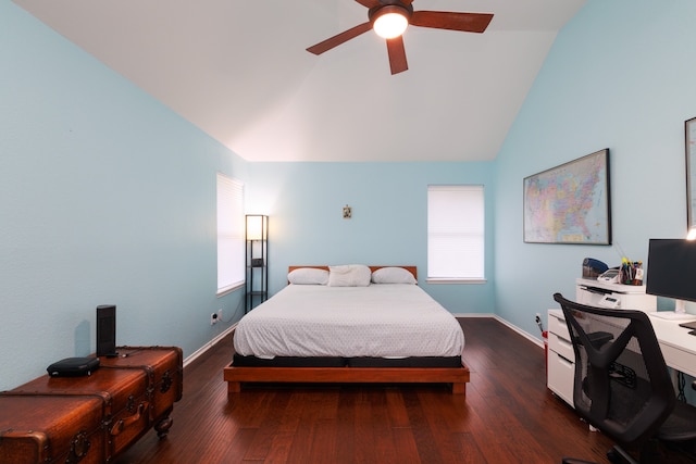 bedroom with high vaulted ceiling, dark wood-type flooring, and ceiling fan