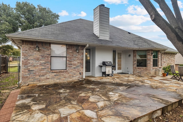 rear view of house with a patio