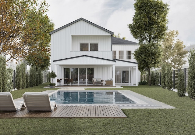 back of house featuring a patio area and a yard