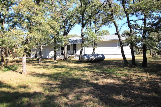 exterior space with a front yard